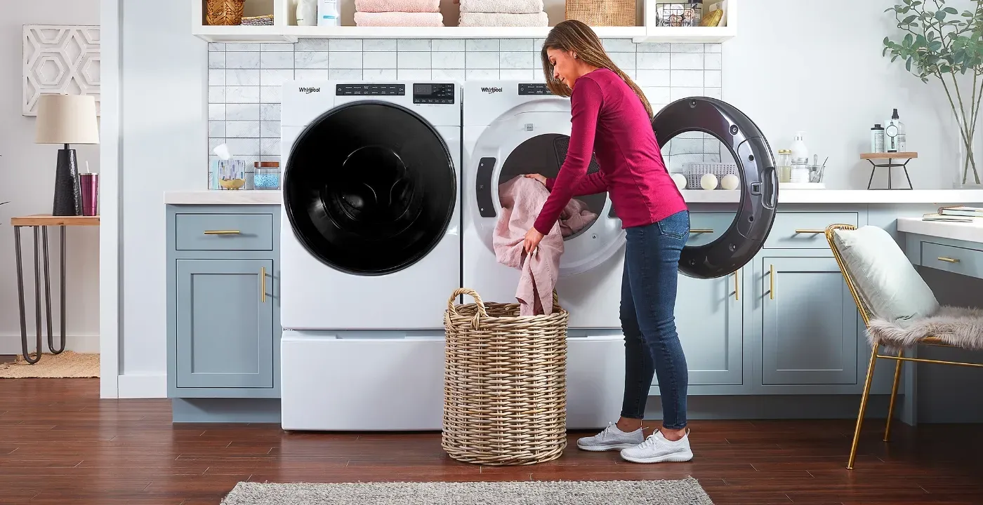 whirlpool laundry and basket in front